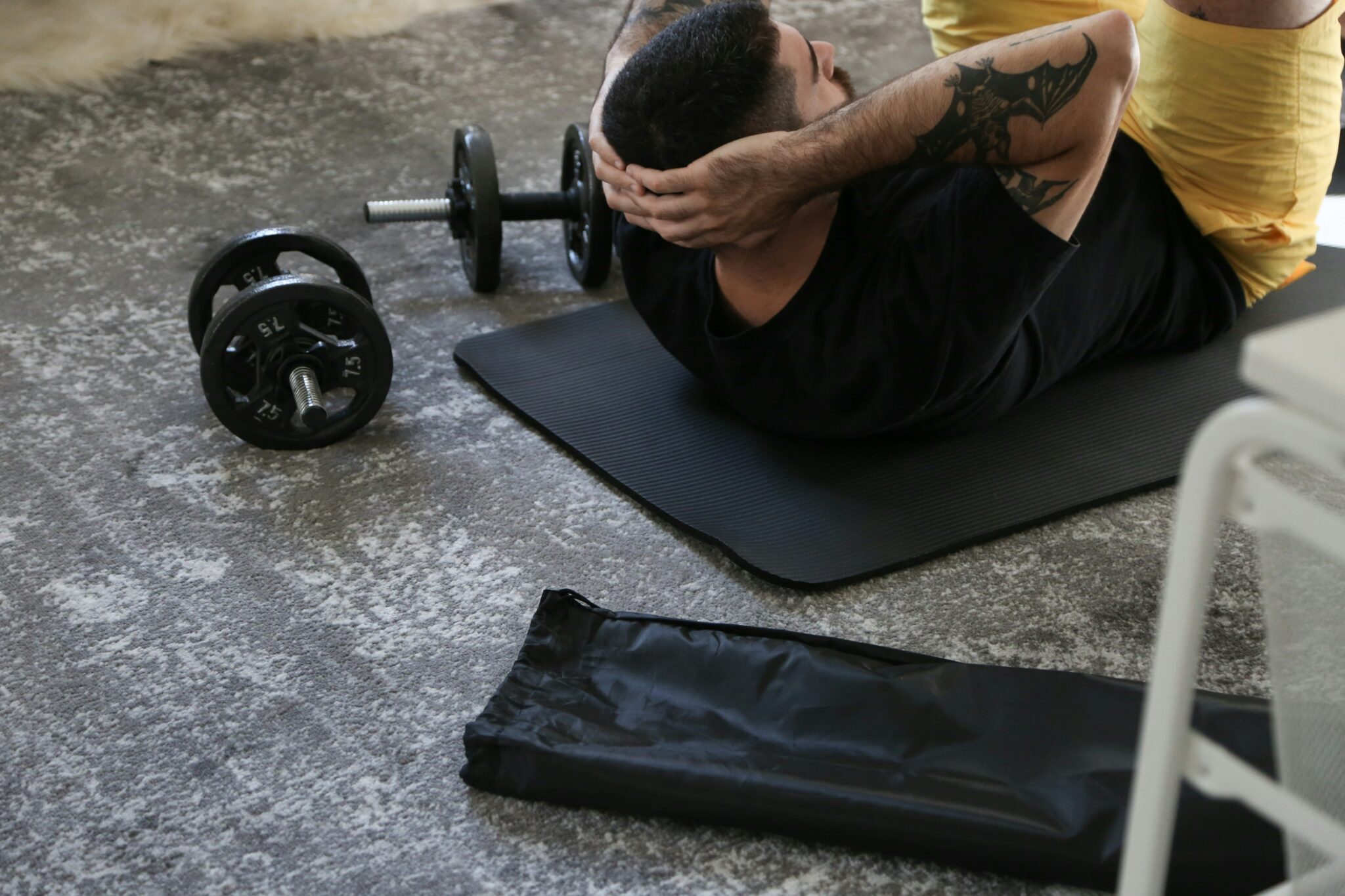 Loaded barbell and bench showing why equipment user weight limits count more than one load