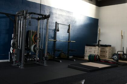 Cable station on a gym floor where cable machine pulley ratios change the load at the handle