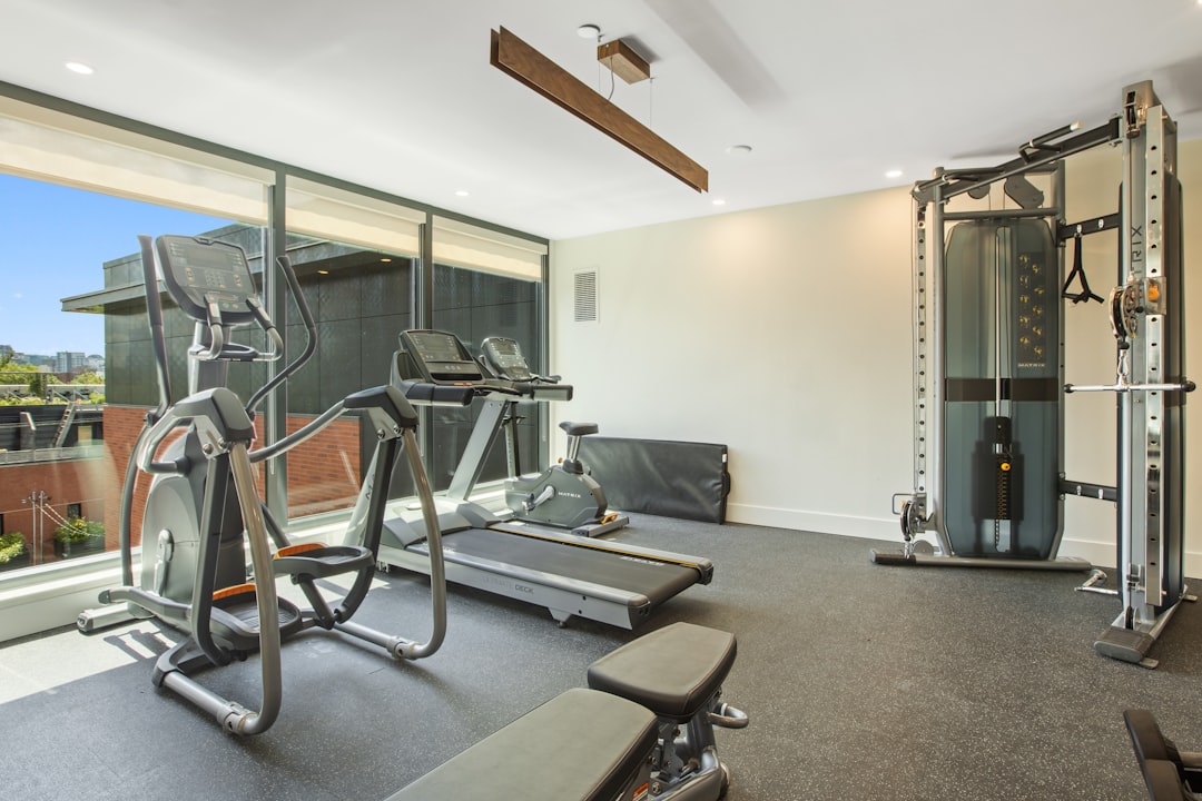 Compact floor where amenity gym equipment shares circulation space