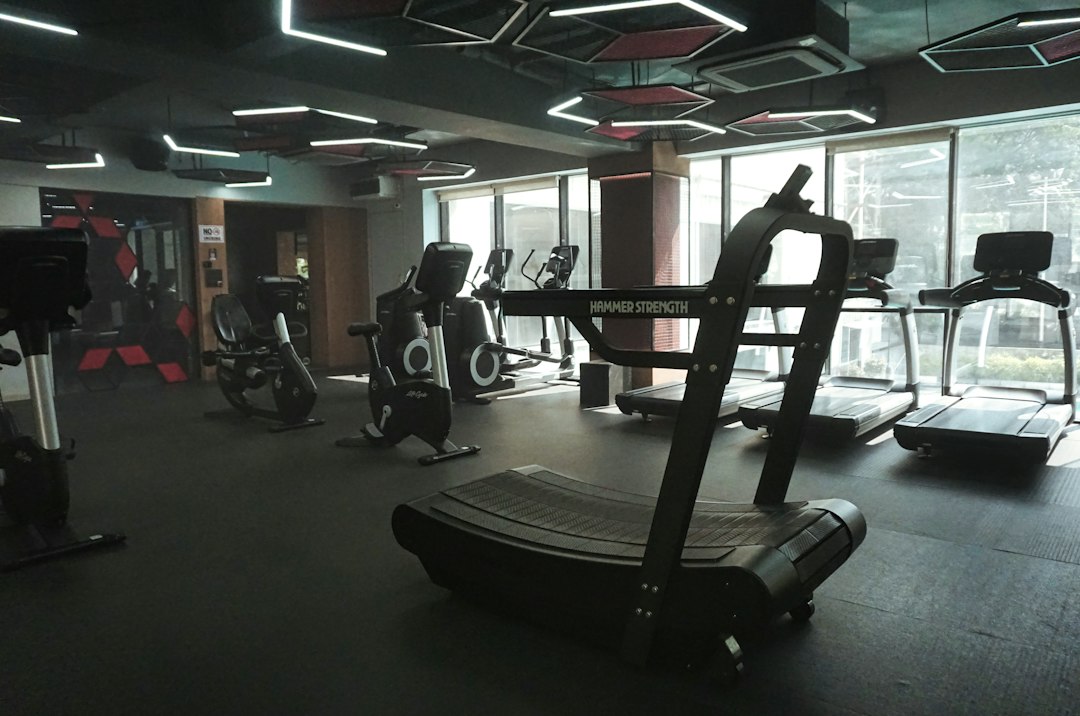 Row of cardio machines on a club floor tracked in an equipment asset register