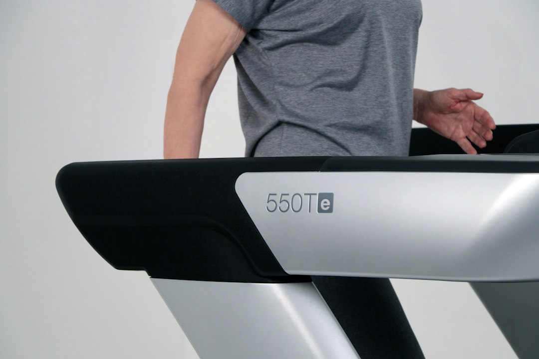 Commercial treadmill in use, a machine served by treadmill power cords rated for continuous duty