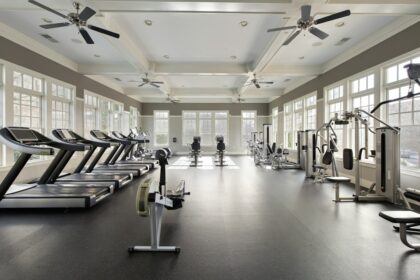 A daylit fitness room of the size most hotel gym equipment packages must fit