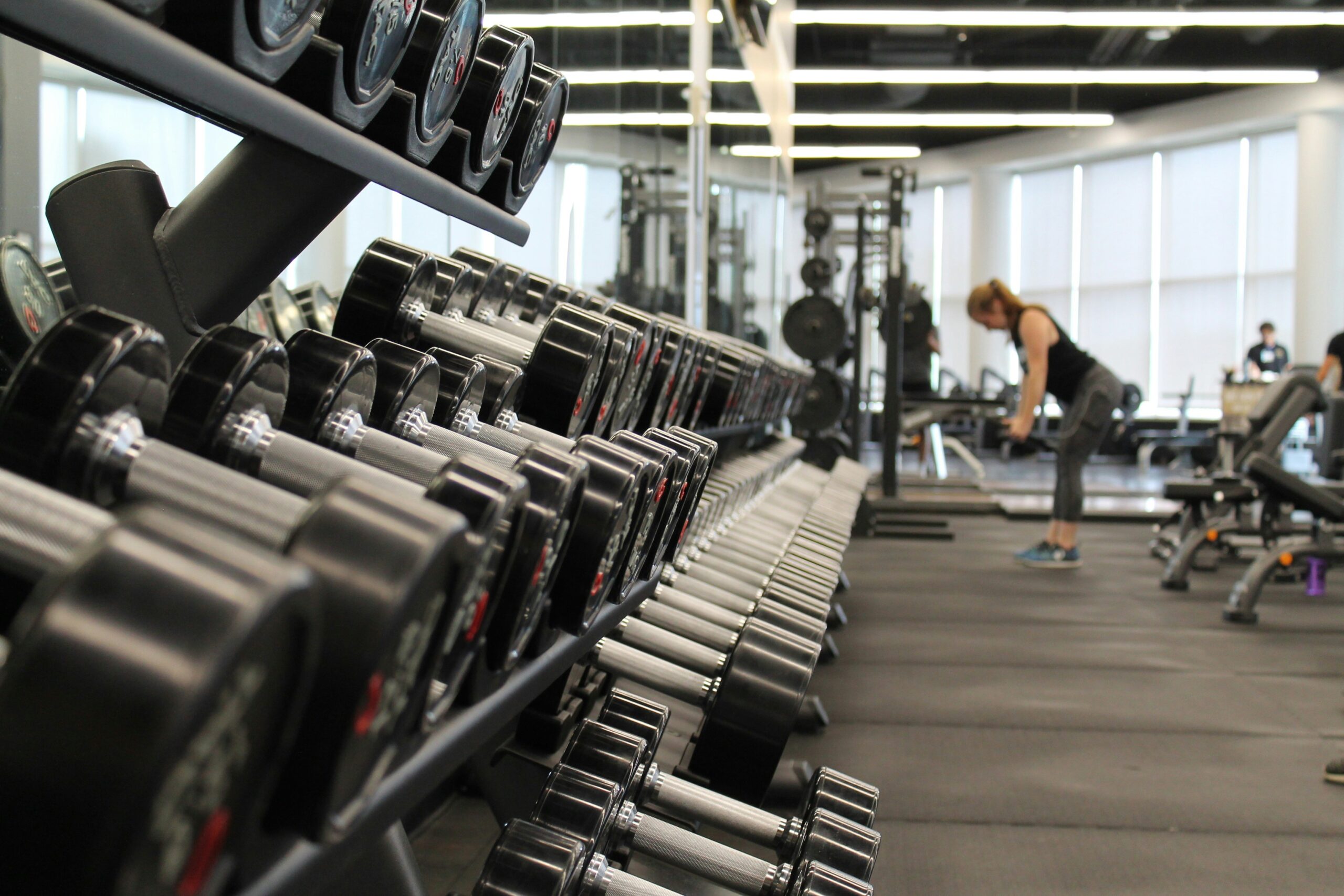 Dumbbell rack and machines of the type commercial equipment exhibitors put on a stand