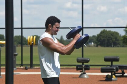 Outdoor session showing mobile personal training equipment in use away from a studio