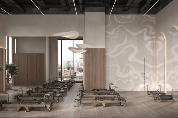 Studio interior where commercial pilates reformers are inspected between client blocks