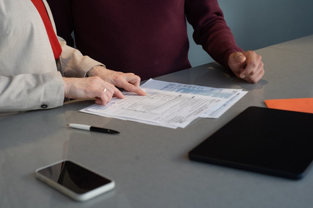 Operators reviewing the paperwork behind a gym equipment leasing decision