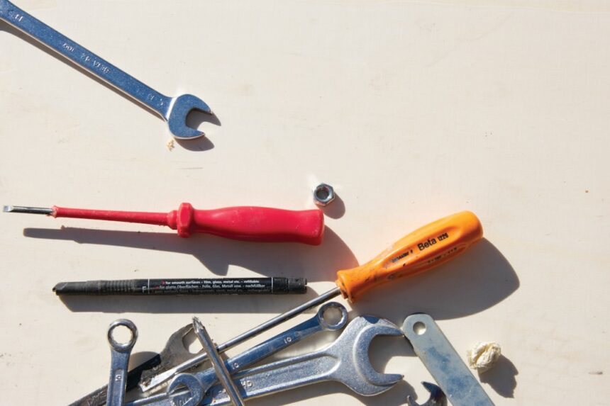Technician tools laid out for a service call on treadmill power cords