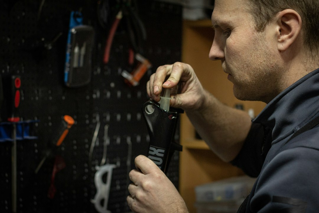 Technician capturing the data an equipment asset register depends on