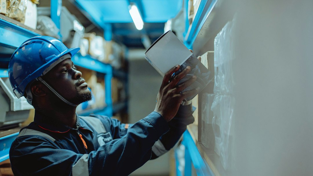 A supervisor checking order paperwork where equipment sales compensation meets the margin line